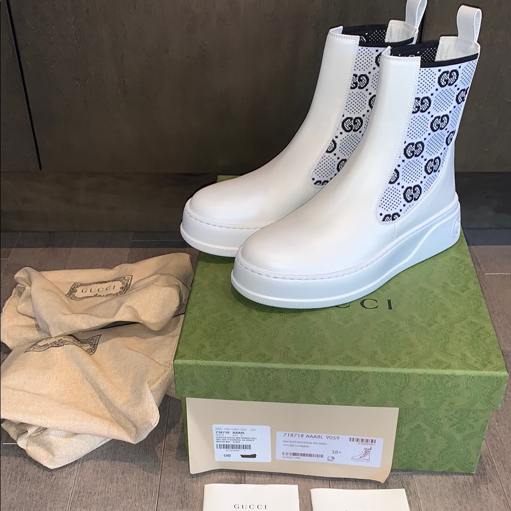 Authentic Gucci White and black Logo Ankle Boots. Brand new in box.